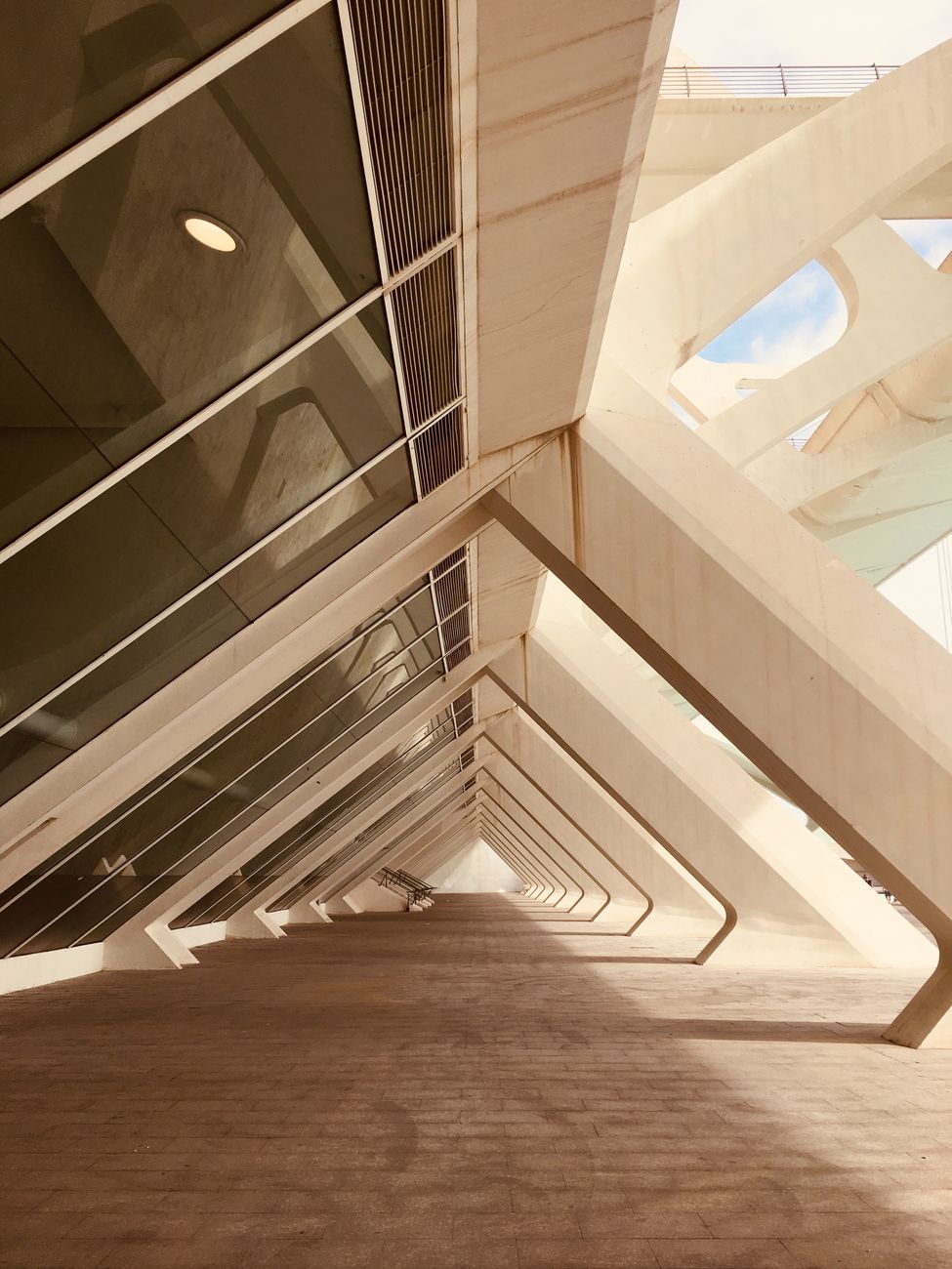 Futuristic architectural arches with glass reflections in València, Spain. Captivating modern design.