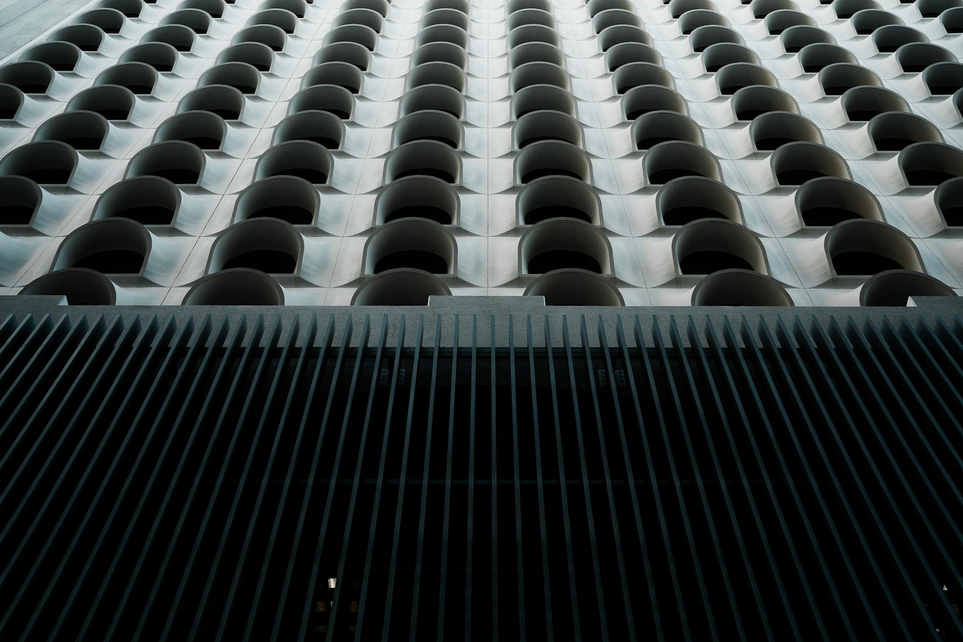 Abstract view of a modern building facade with striking geometric patterns in Phoenix, AZ.