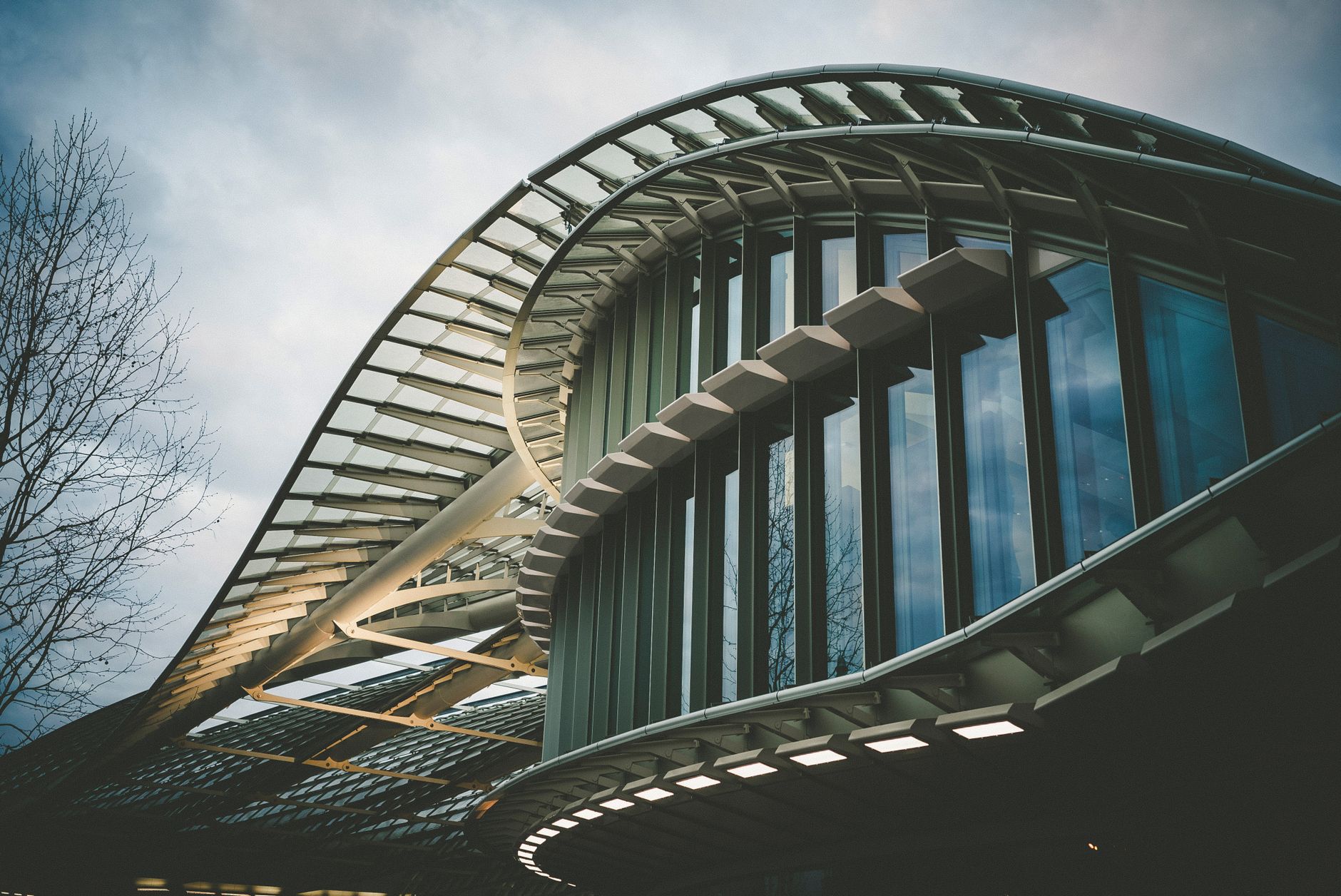 Dynamic view of the modern La Canopée facade in Paris, showcasing an architectural marvel in the cityscape.