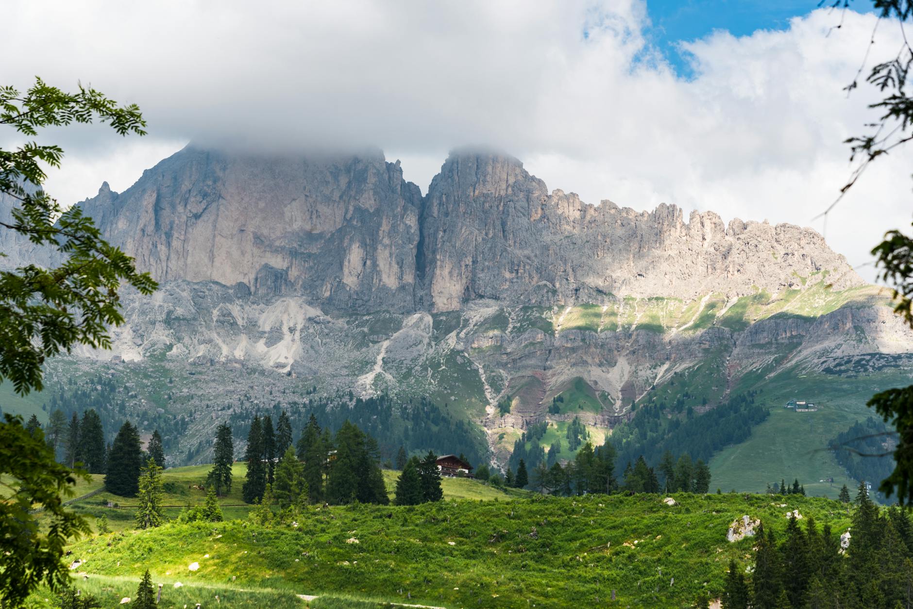 Breathtaking view of the Dolomites with lush greenery in Trentino-South Tyrol, Italy.