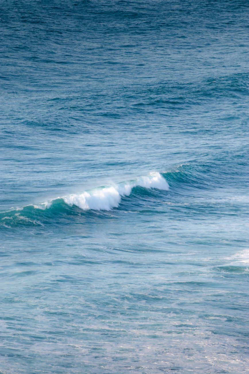 Gentle ocean waves creating a peaceful and calming sea surface view.