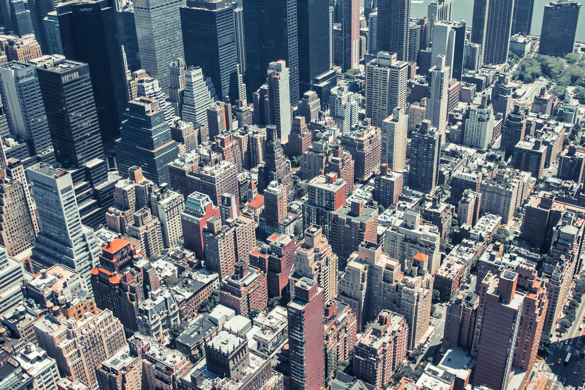 Aerial view showcasing the dense urban landscape of New York City skyscrapers.