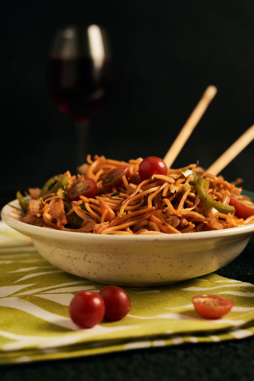 Close-up of a flavorful Asian noodle dish with vegetables, perfect for a main course meal.