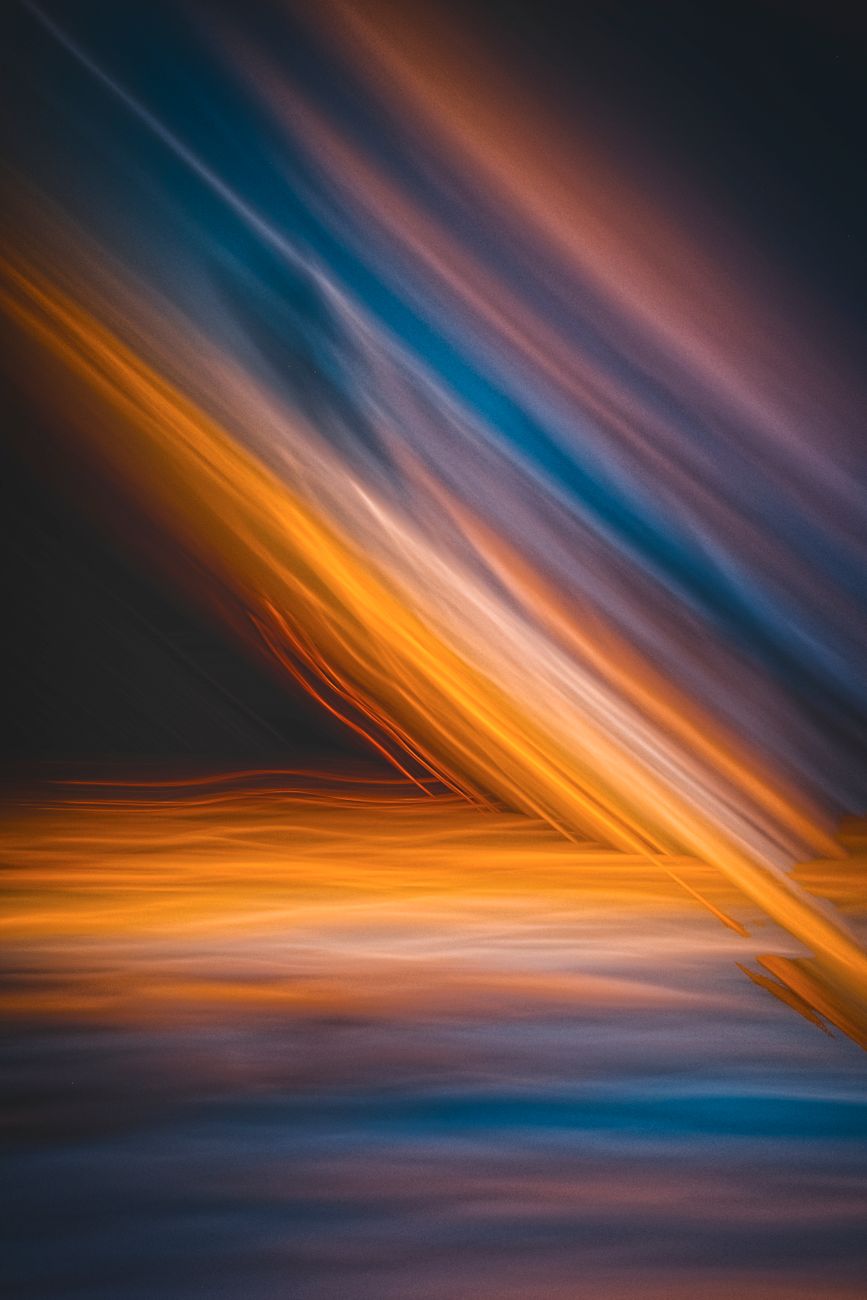 Colorful abstract motion capturing dynamic light streaks with a dreamlike atmosphere.