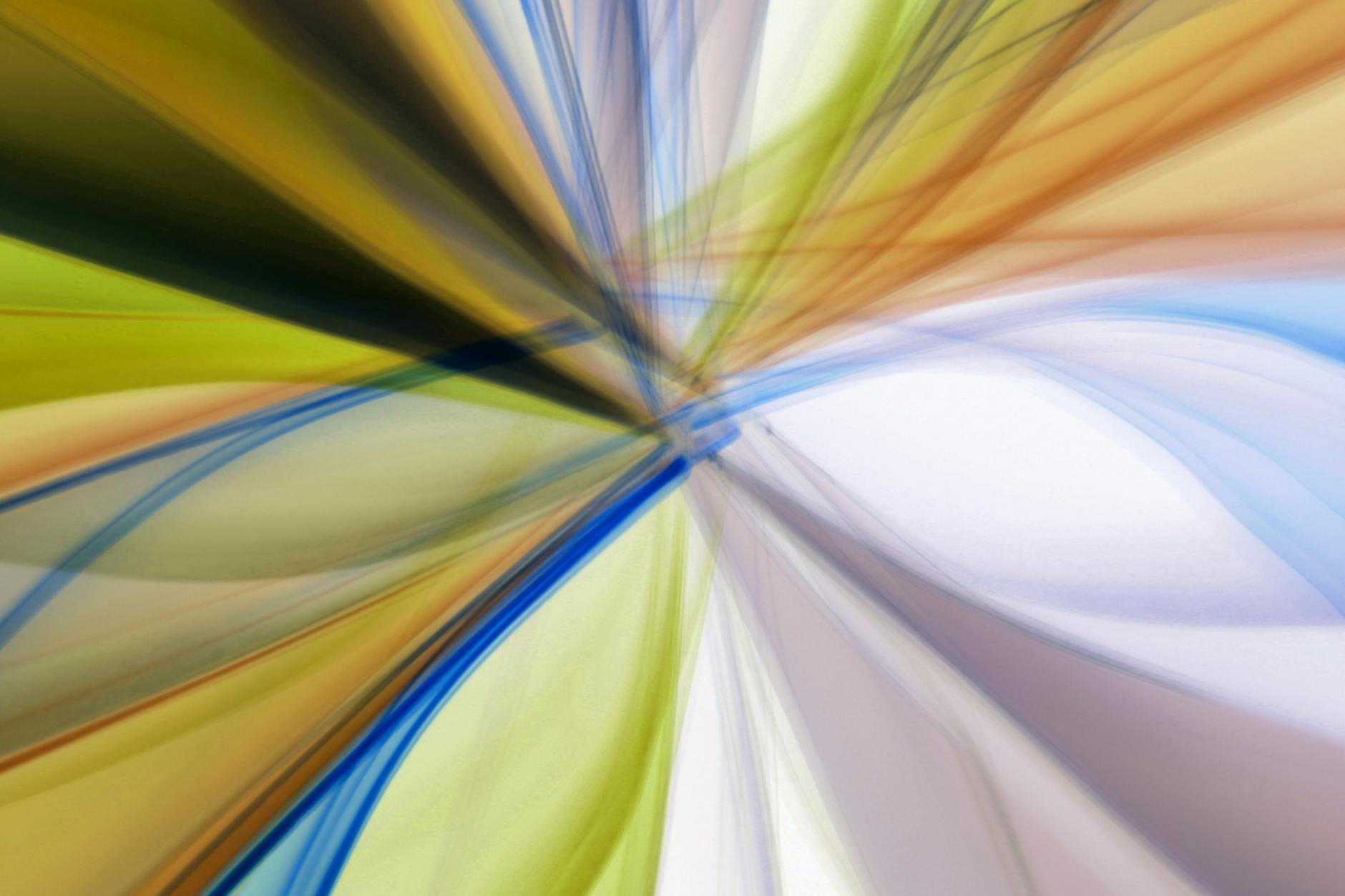 Vibrant abstract artwork featuring a swirl of colors in a dynamic motion pattern.