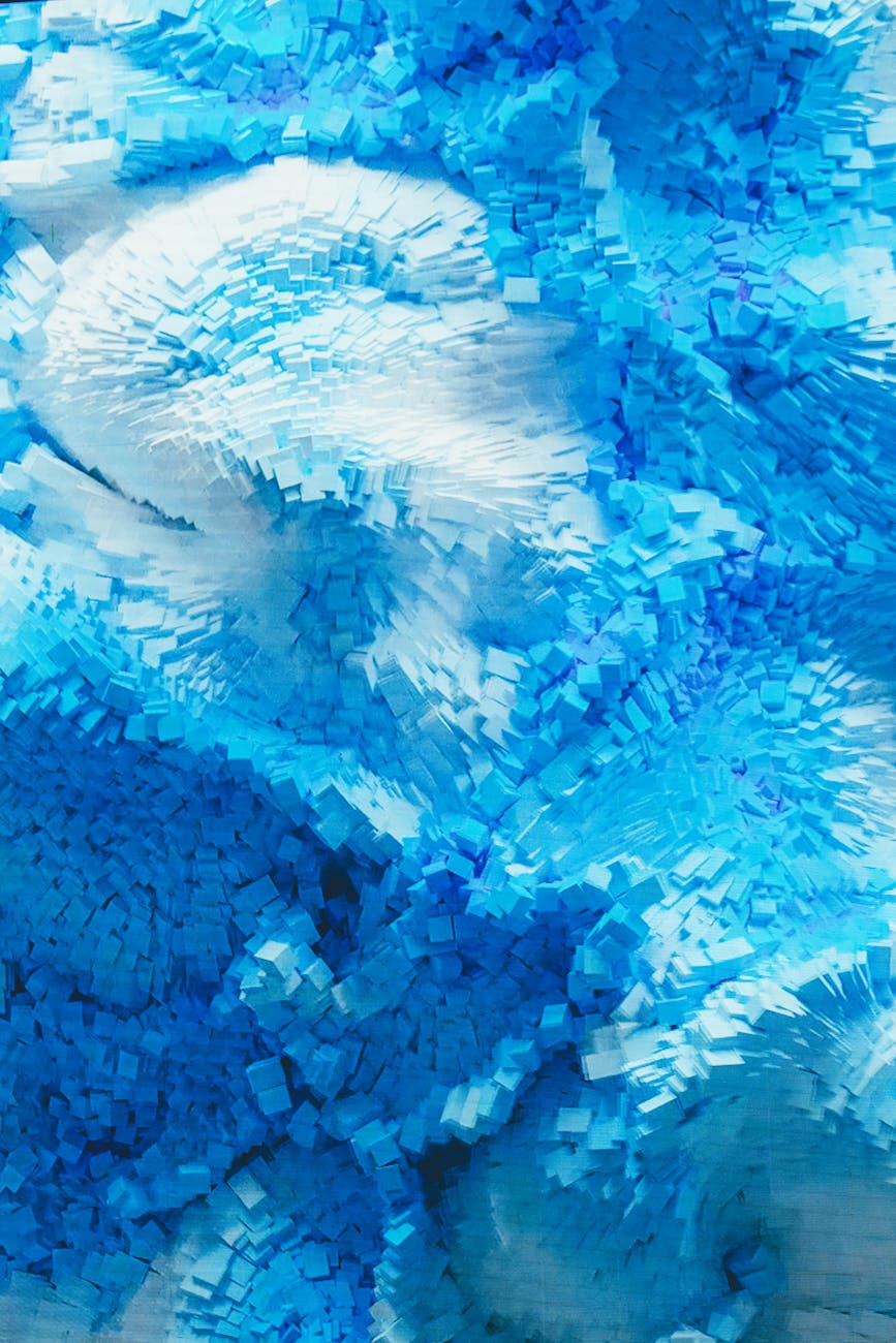 Vibrant abstract artwork featuring blue and white textured patterns with a dynamic feel.