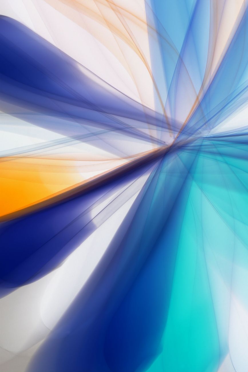 A vibrant and abstract artwork featuring colorful light streaks in blue, orange, and teal hues.