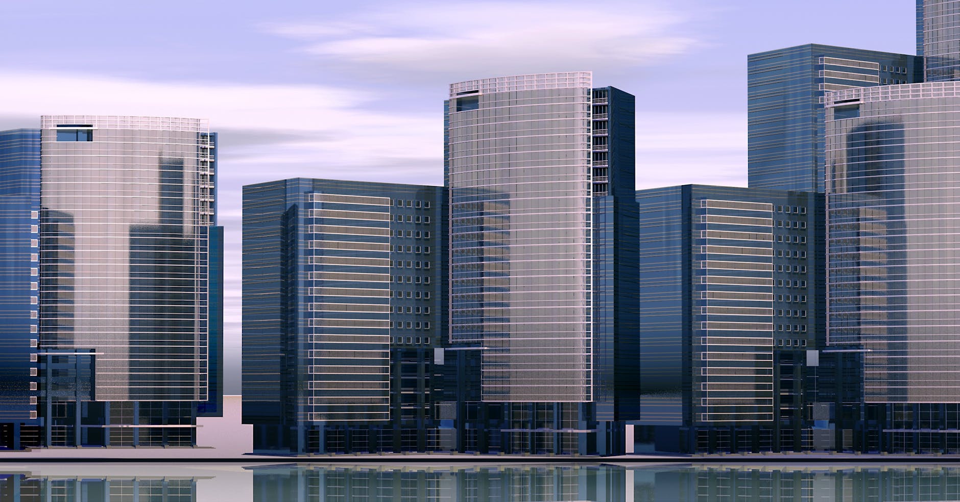 A cityscape with contemporary glass skyscrapers reflecting in water on a clear day.