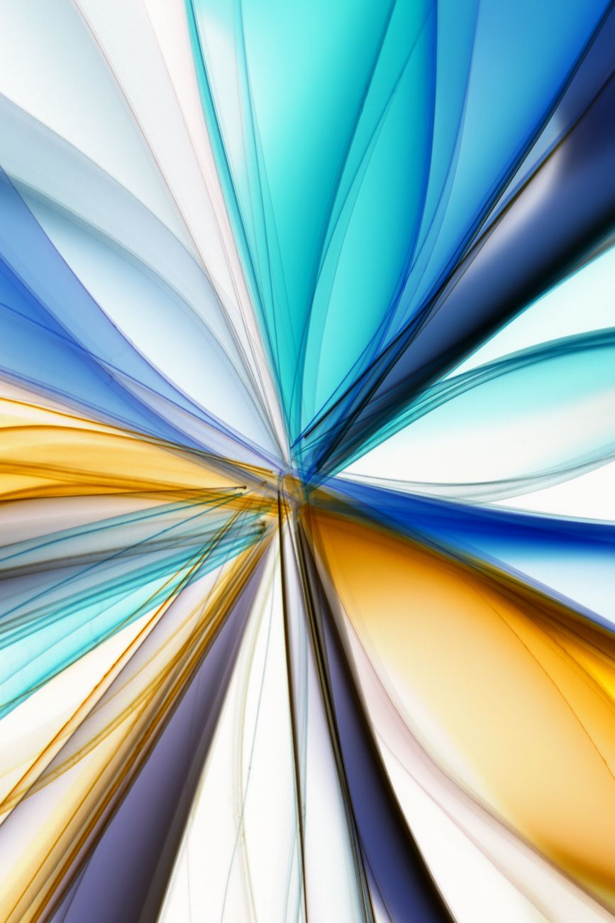 Vibrant abstract art featuring flowing blue, orange, and white colors in dynamic motion.
