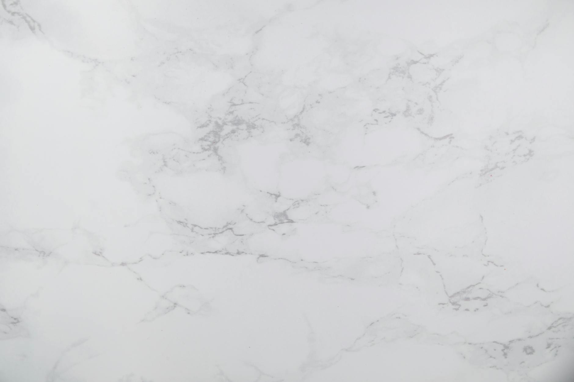 White marble texture with subtle gray veins, perfect for design backgrounds.