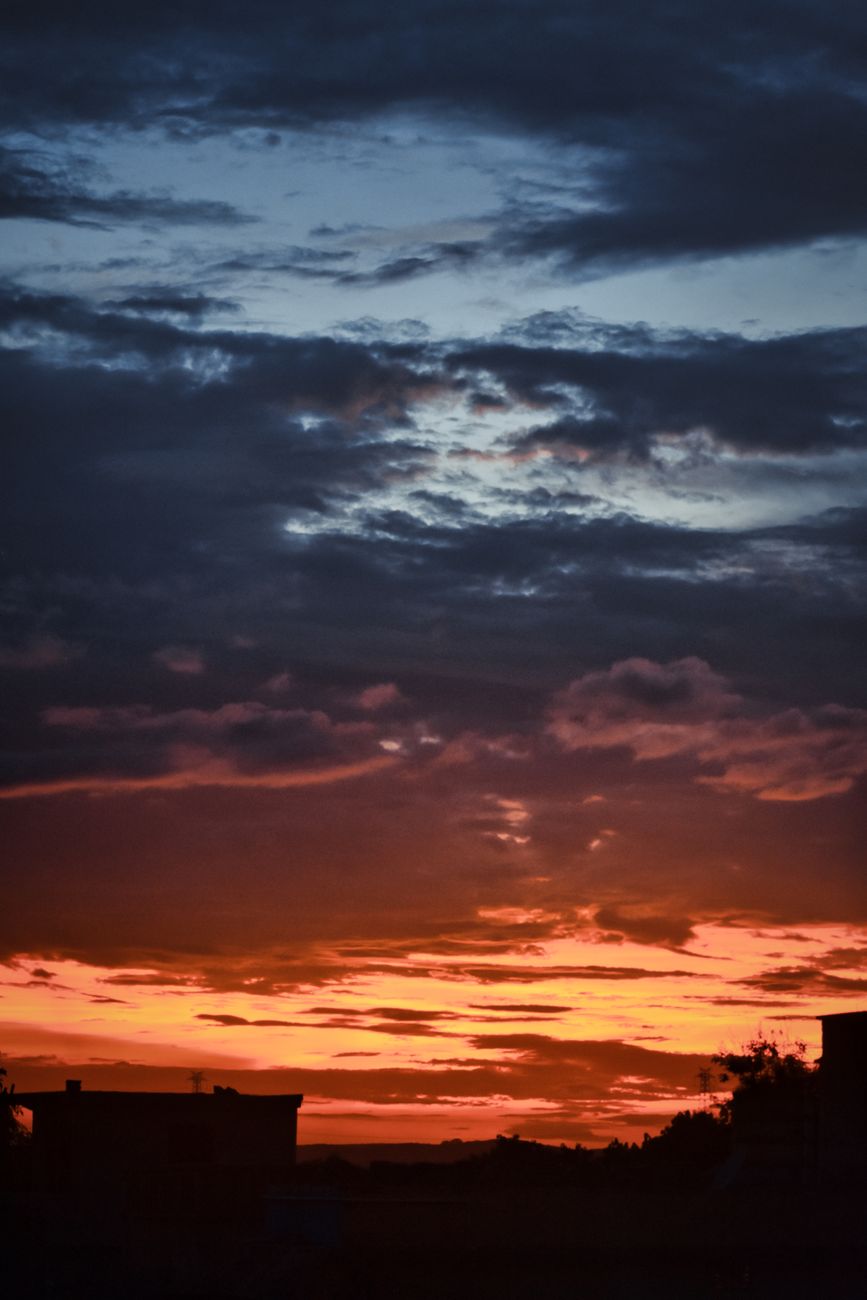 Stunning sunset with vibrant colors and dramatic clouds, perfect for nature lovers.