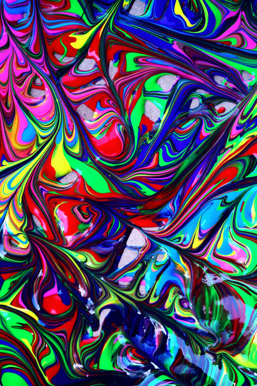 Colorful abstract painting with vivid swirls and a trippy pattern.