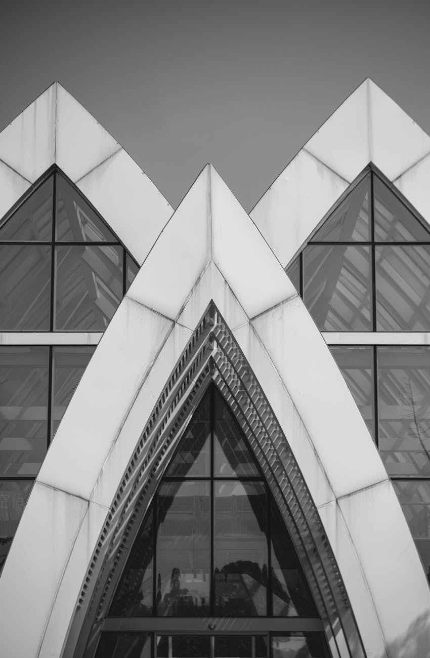 Monochrome view of the Jubilee Church's modern architectural facade in Rome, Italy.