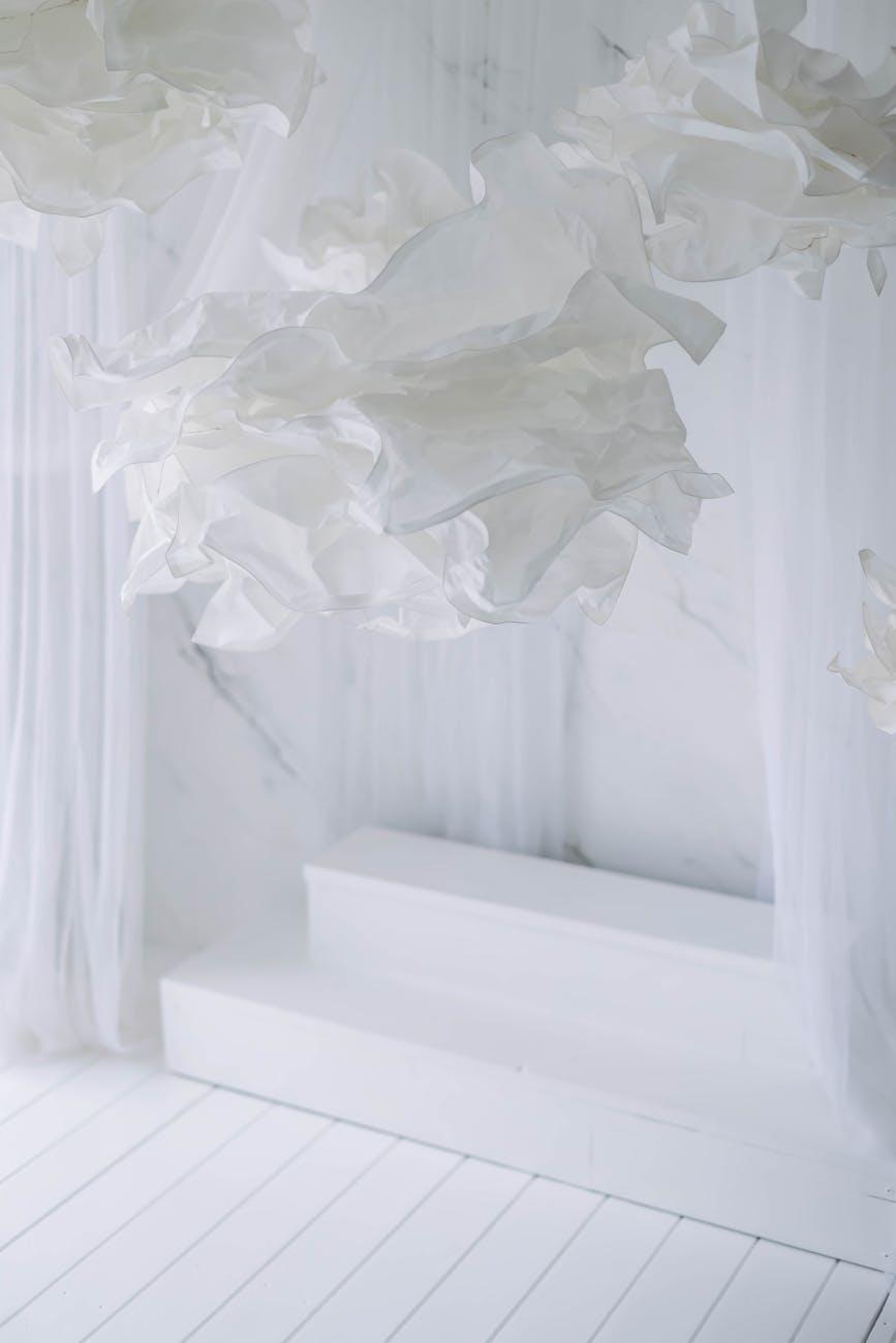 White fabric art installation with dreamy aesthetics, perfect for contemporary interior decor.