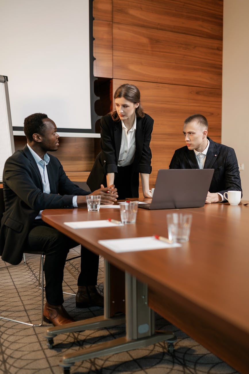 Professional team discussing projects in a modern office.