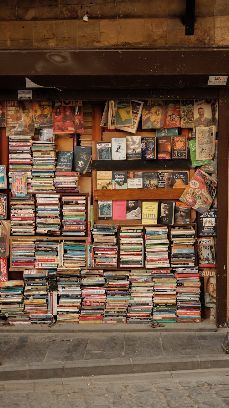 Stacks of antique and vintage books on display in a Gaziantep bookstore.