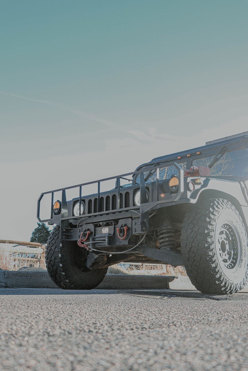 High-angle view of an off-road vehicle parked outdoors on a sunny day.