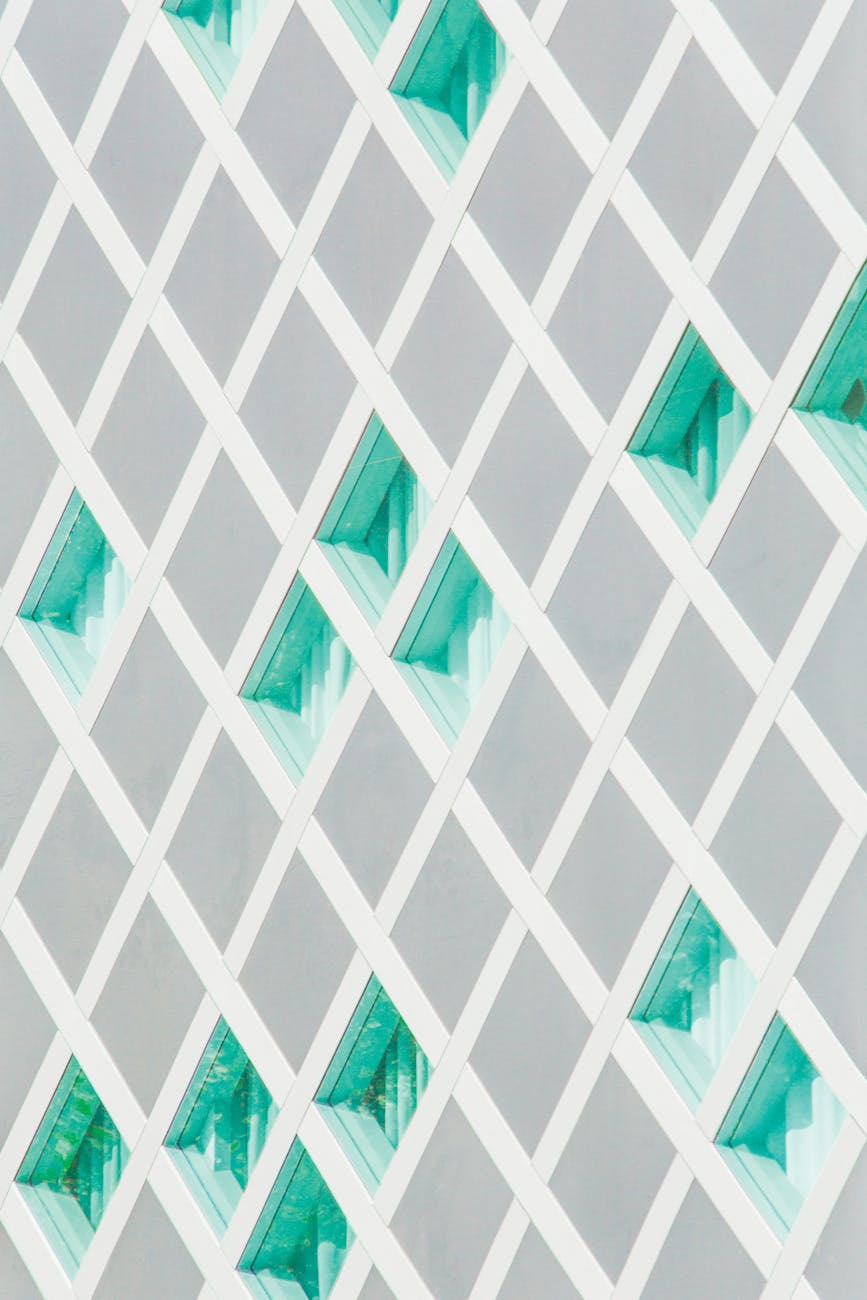 Intricate geometric design with diamond patterns and teal accents, perfect for modern backgrounds.