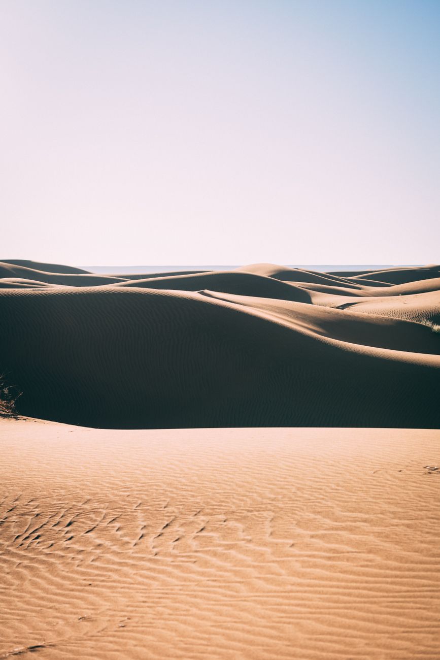 Captivating view of sand dunes in Al Wahat Al Dakhla, Egypt, showcasing nature's beauty.