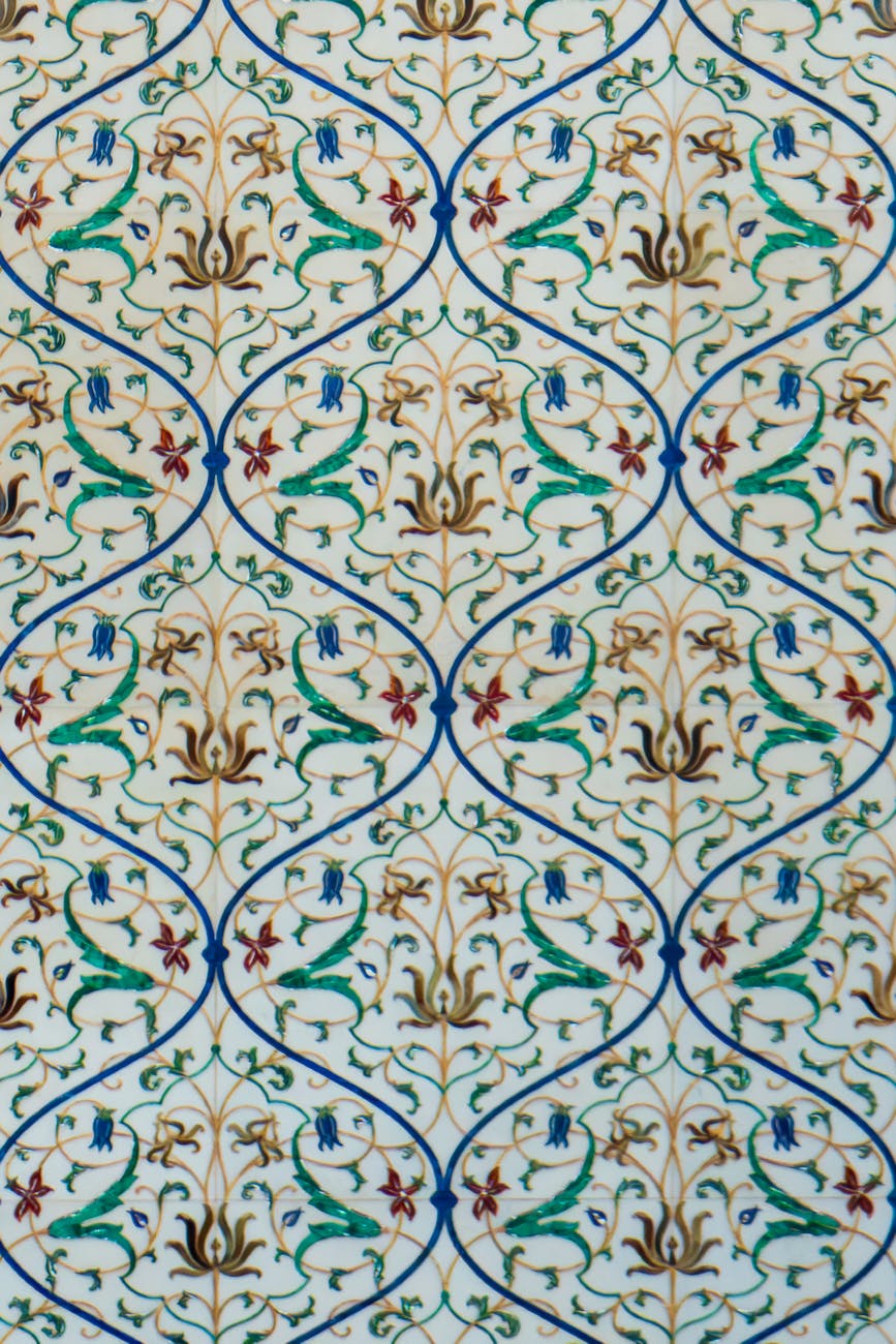 Detailed Islamic mosaic with geometric and floral patterns, showcasing traditional craftsmanship.