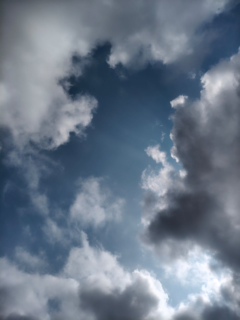 Captivating sky with dramatic clouds and rays of sunlight in Silchar, Assam, India.