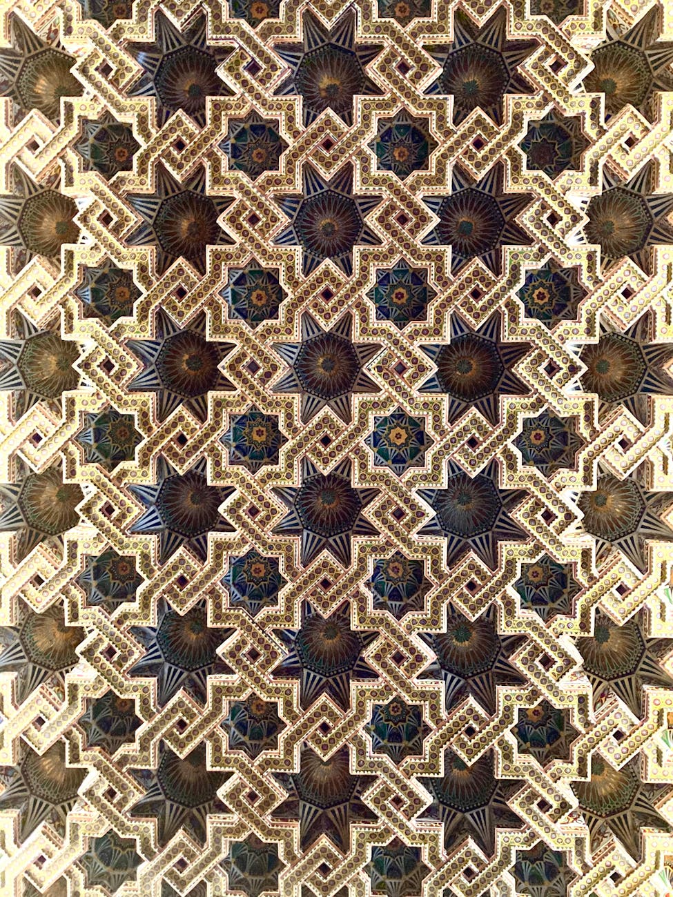 Detailed view of stunning Islamic geometric patterns showcasing intricate artistry.