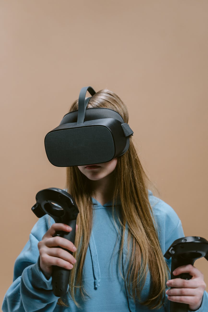 Close-up of a woman using a virtual reality headset and controllers indoors.