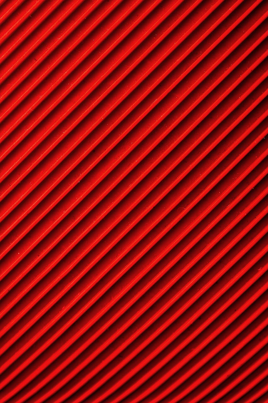 Vibrant diagonal red and black pattern, ideal for abstract backgrounds and designs.