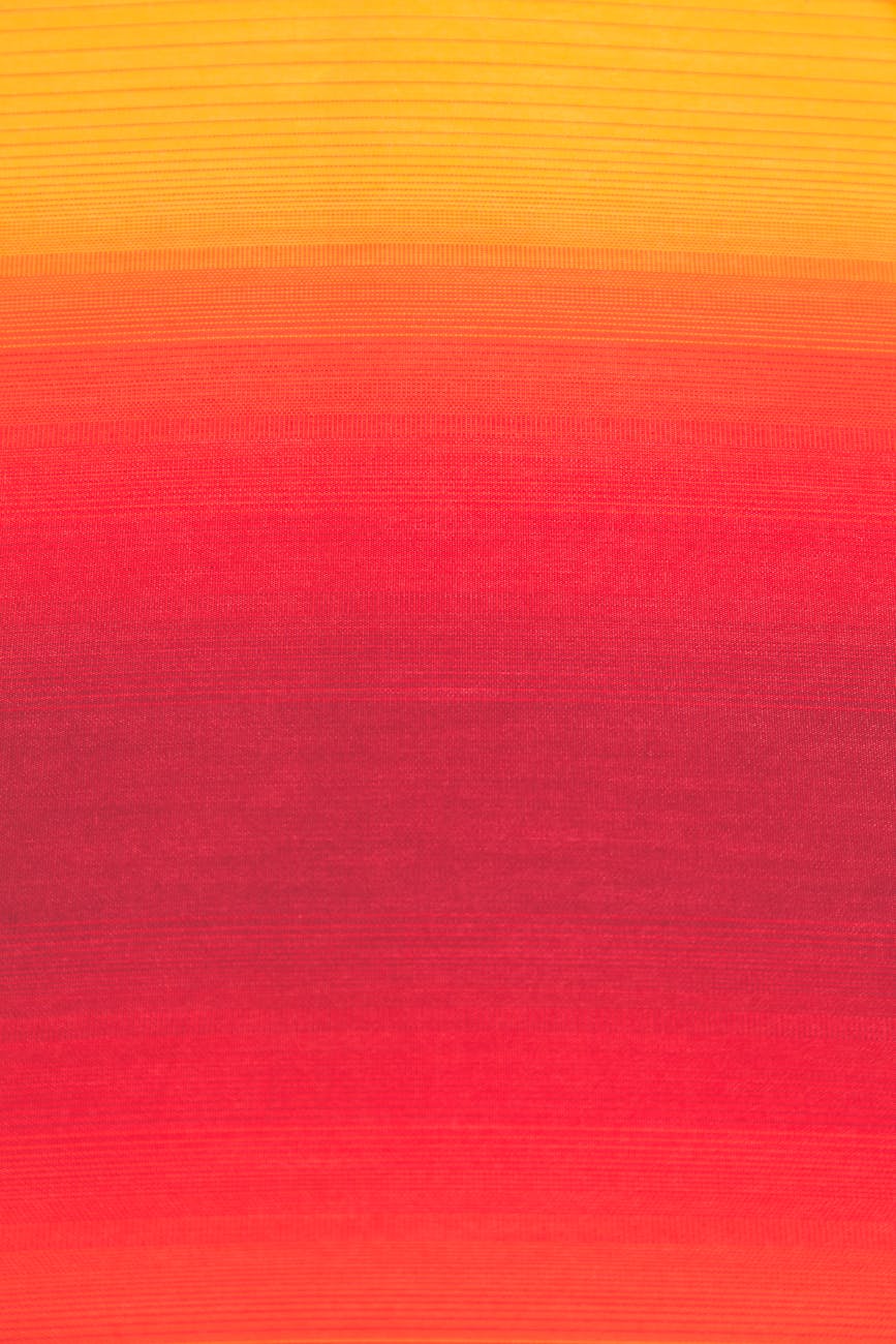 Bright and colorful gradient design in red and yellow hues, ideal for backgrounds and textiles.