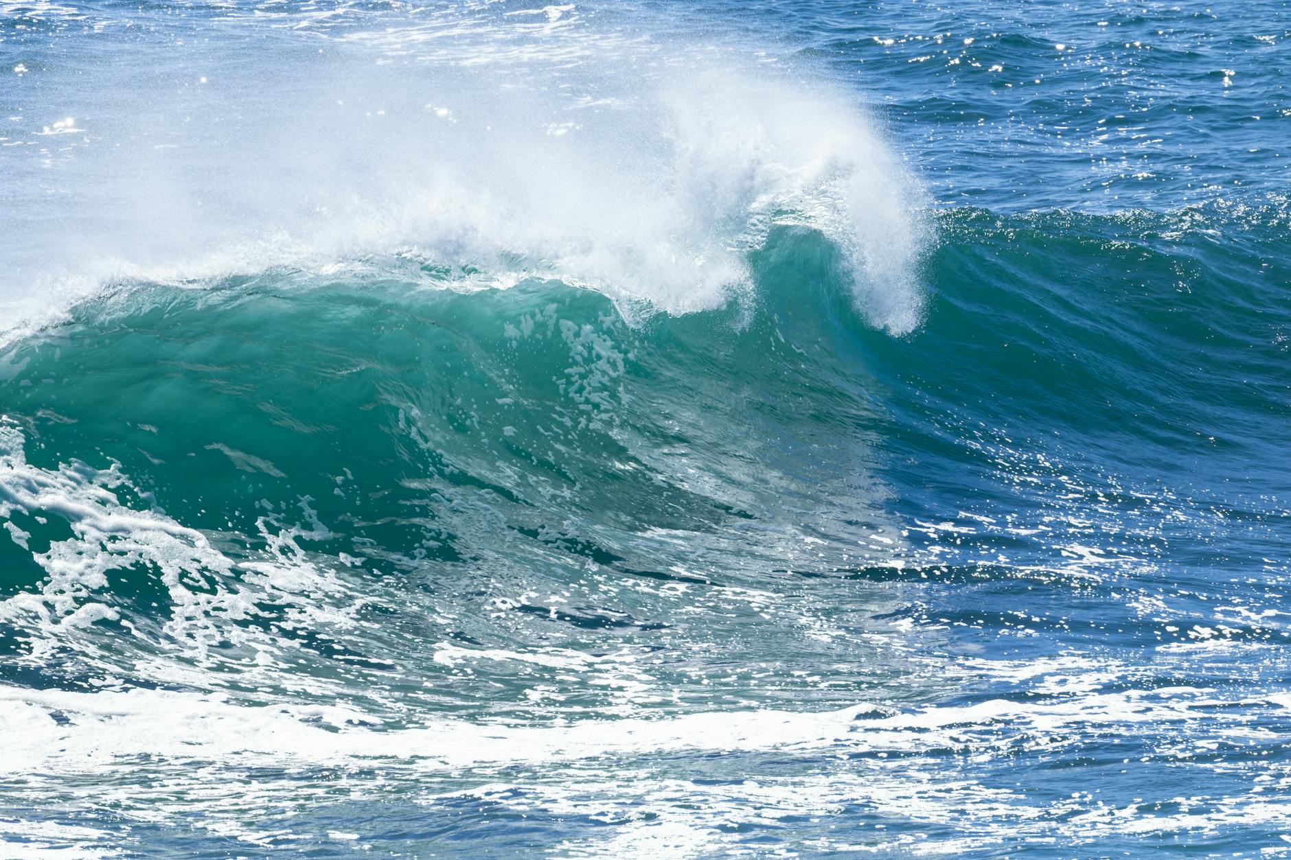 Captivating ocean wave crashing at Culburra Beach, New South Wales, Australia.