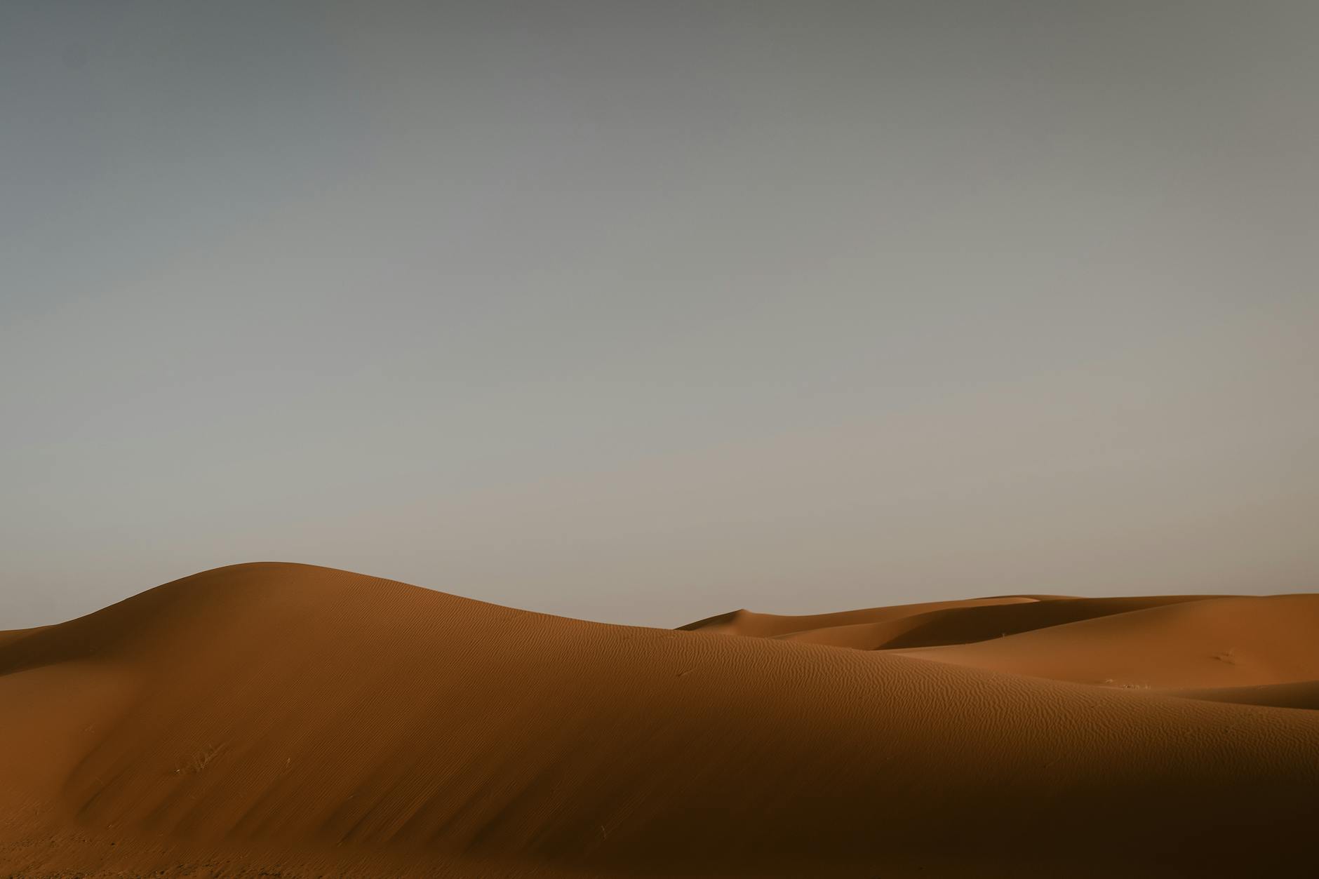 Peaceful view of the Merzouga sand dunes in the Sahara Desert, Morocco.