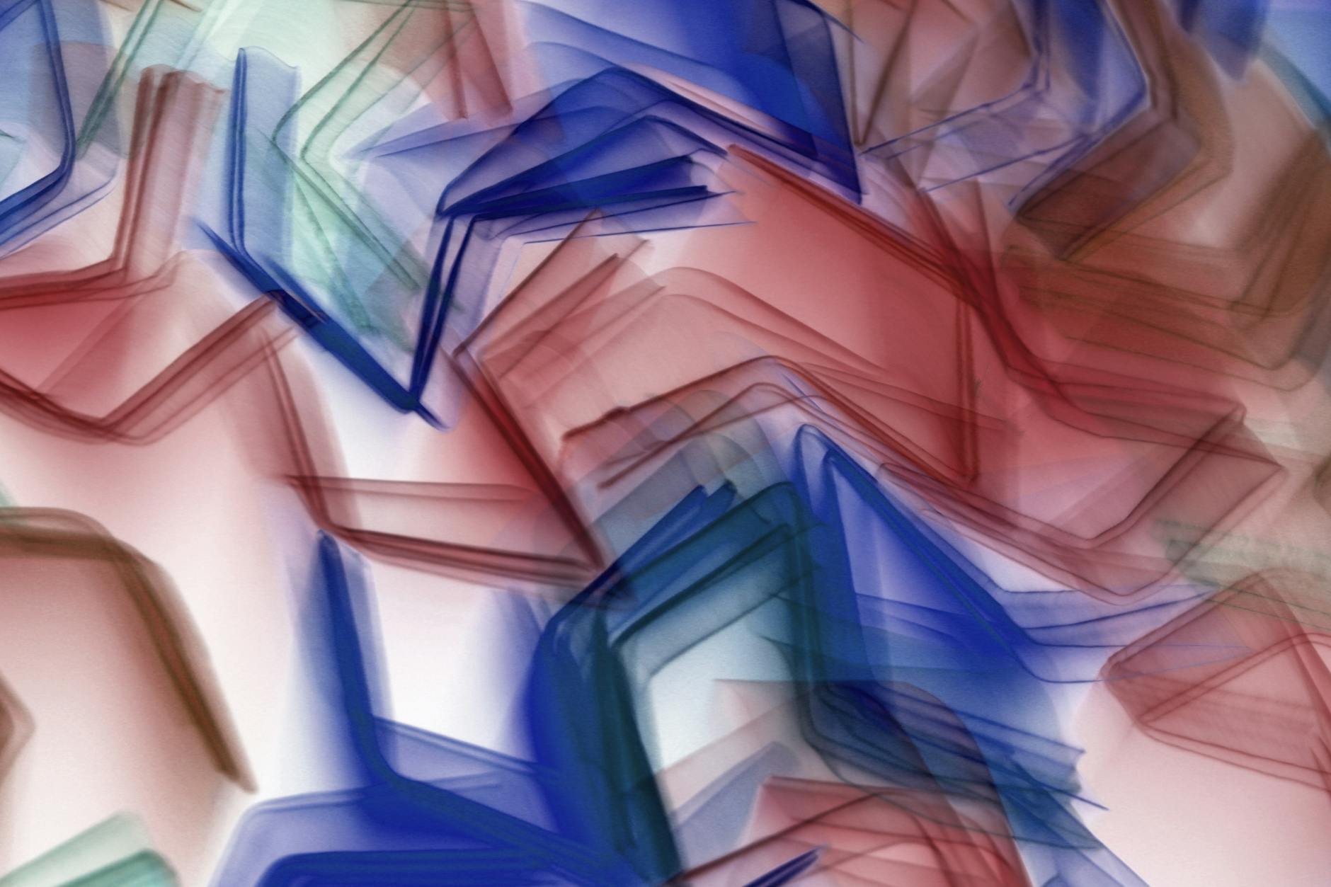 Dynamic abstract artwork with vibrant red and blue geometric patterns creating a modern artistic effect.
