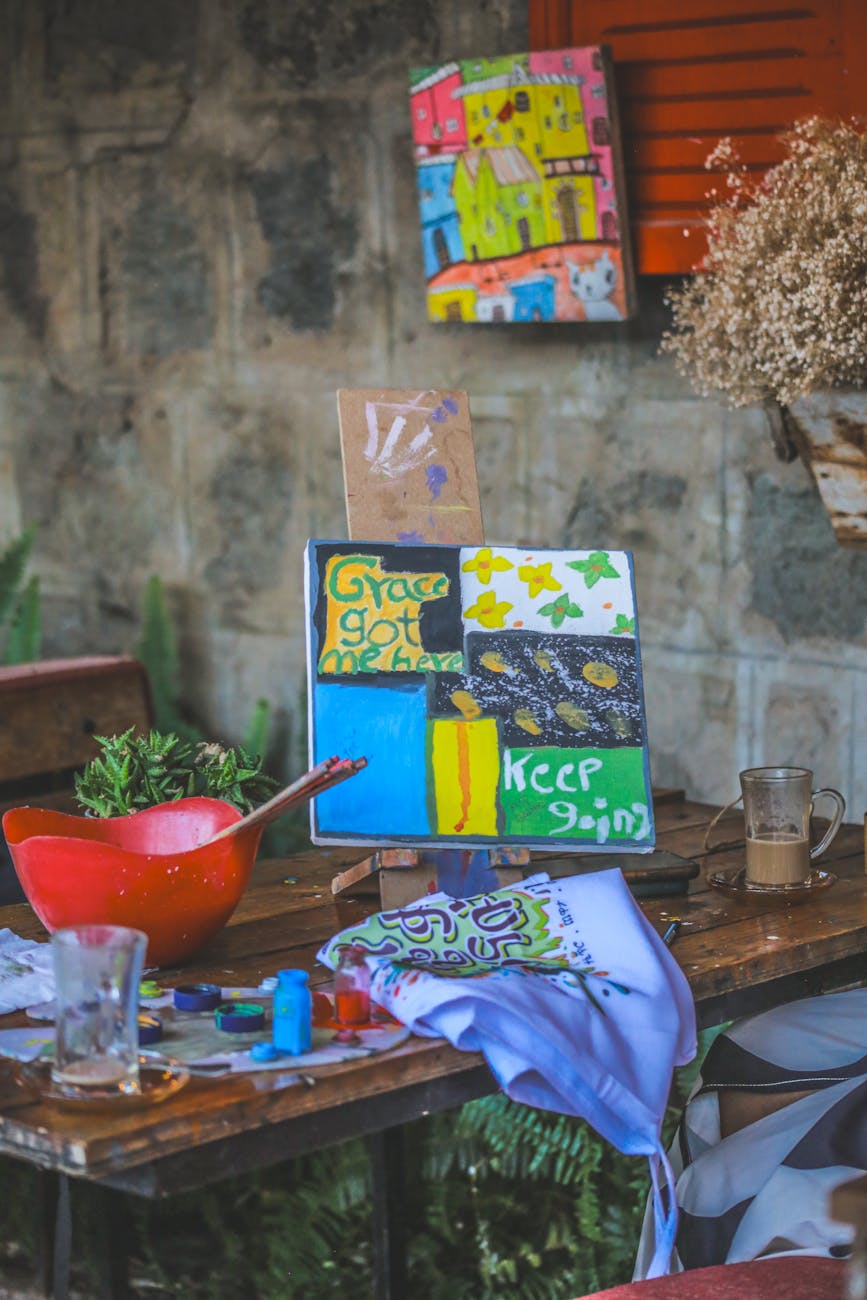 Vibrant abstract painting setup with brushes, canvas, and art supplies in Addis Ababa.
