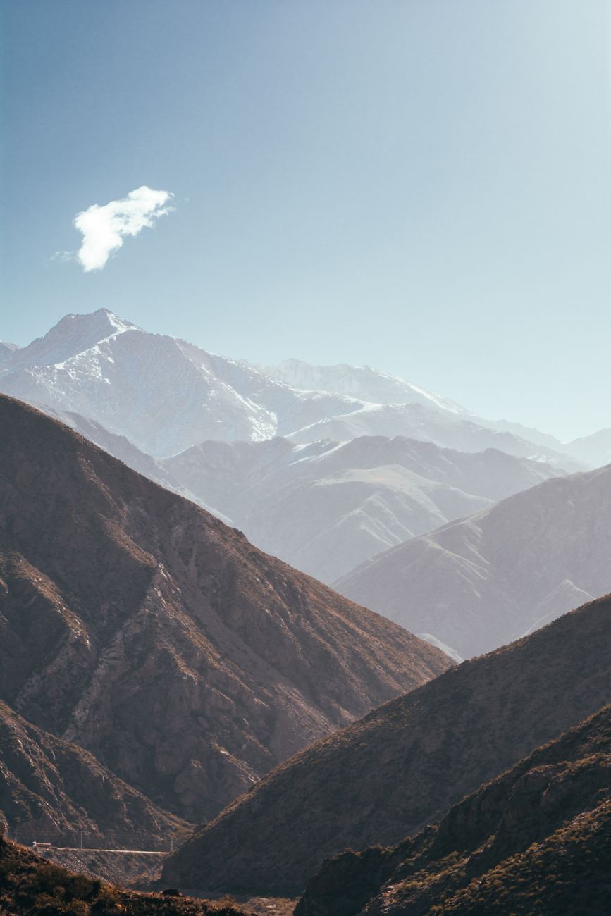 Majestic Andes mountains under clear skies in Mendoza, Argentina, showcasing stunning natural beauty.