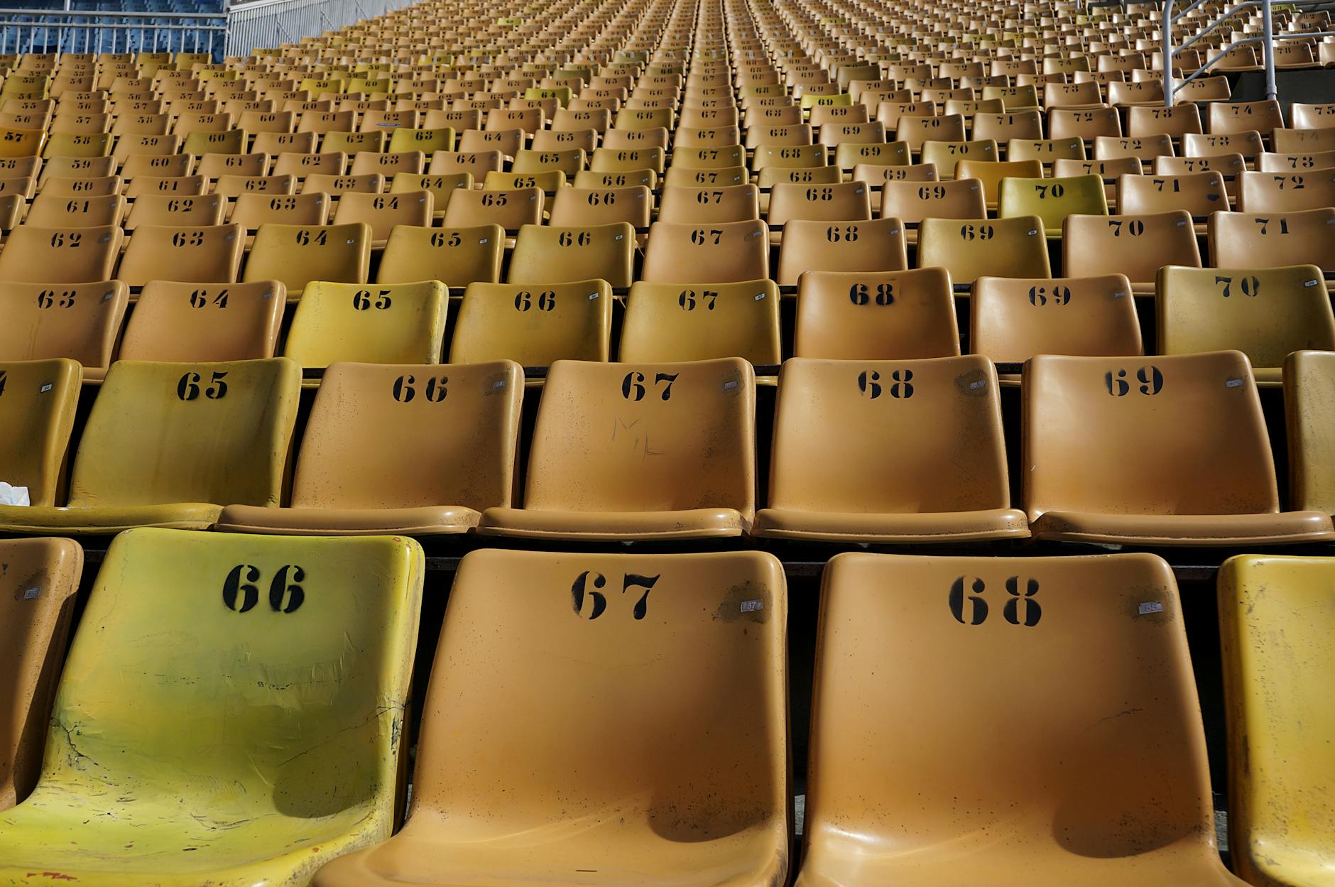 Rows of empty numbered seats at a stadium in São Paulo, ideal for sports or event photography.