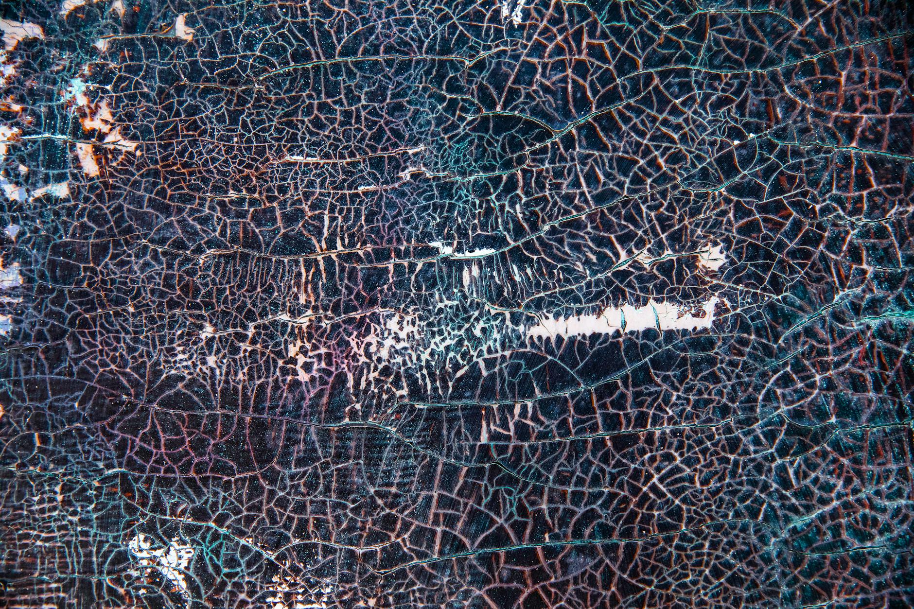 A detailed abstract image showing cracked texture pattern ideal for backgrounds or artistic projects.