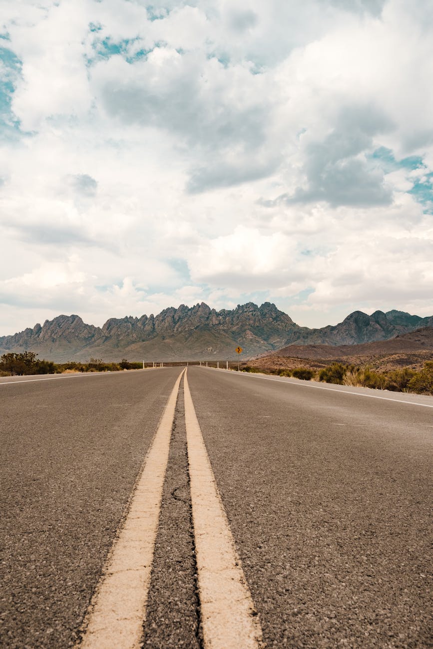 Empty road with mountain view in New Mexico on a clear day.