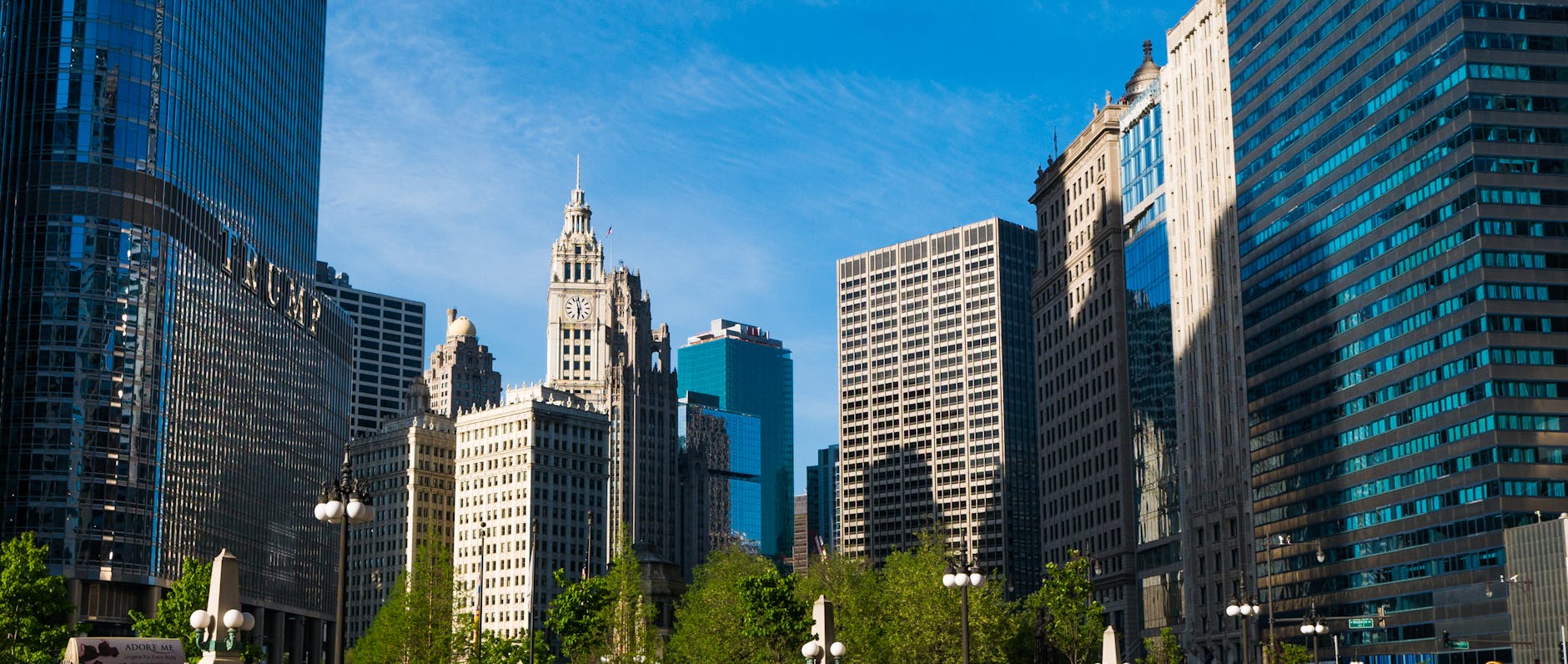 Capture of Chicago's modern skyscrapers and historic architecture under a vibrant blue sky.