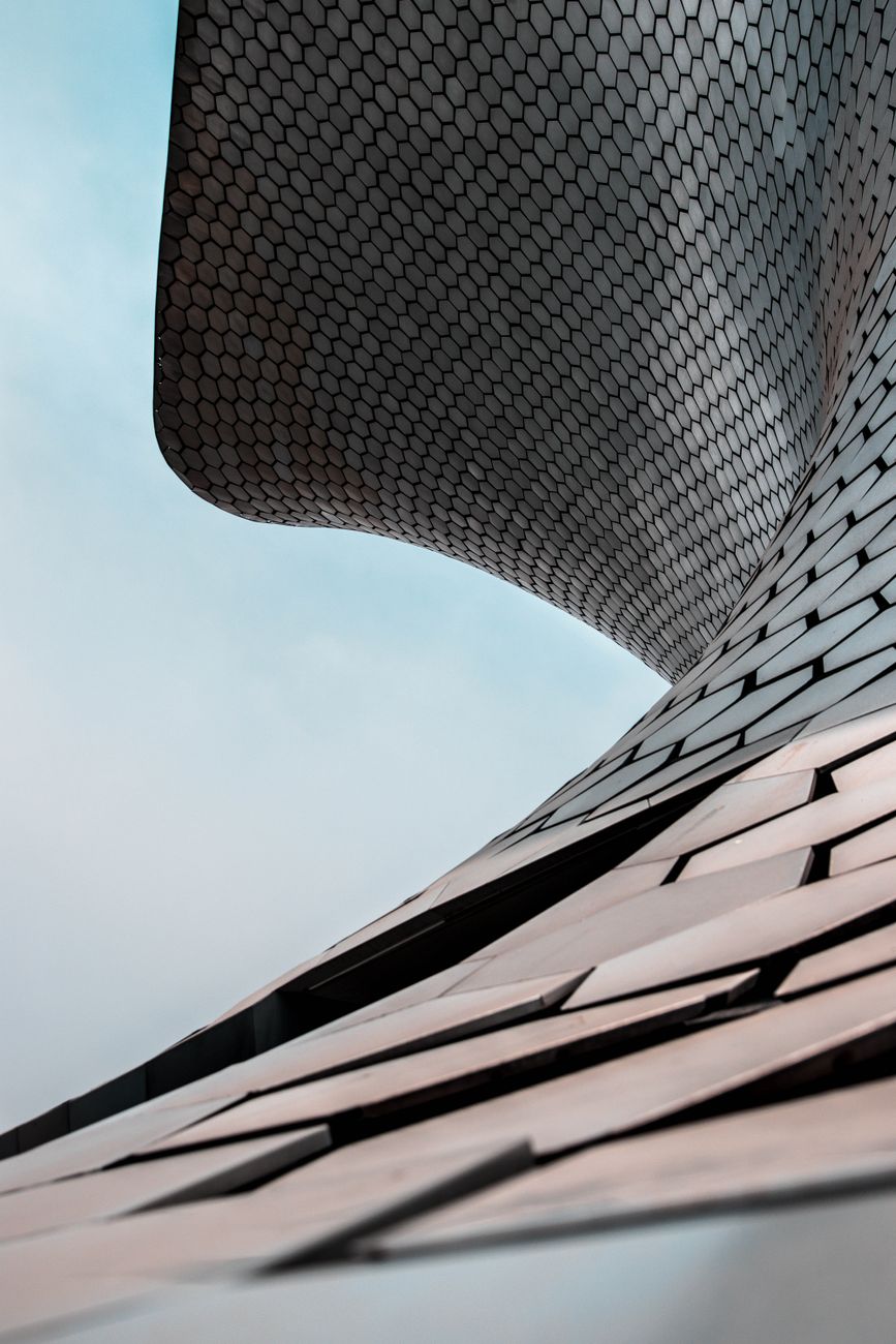 Architectural detail of Museo Soumaya's unique metallic facade in Mexico City.