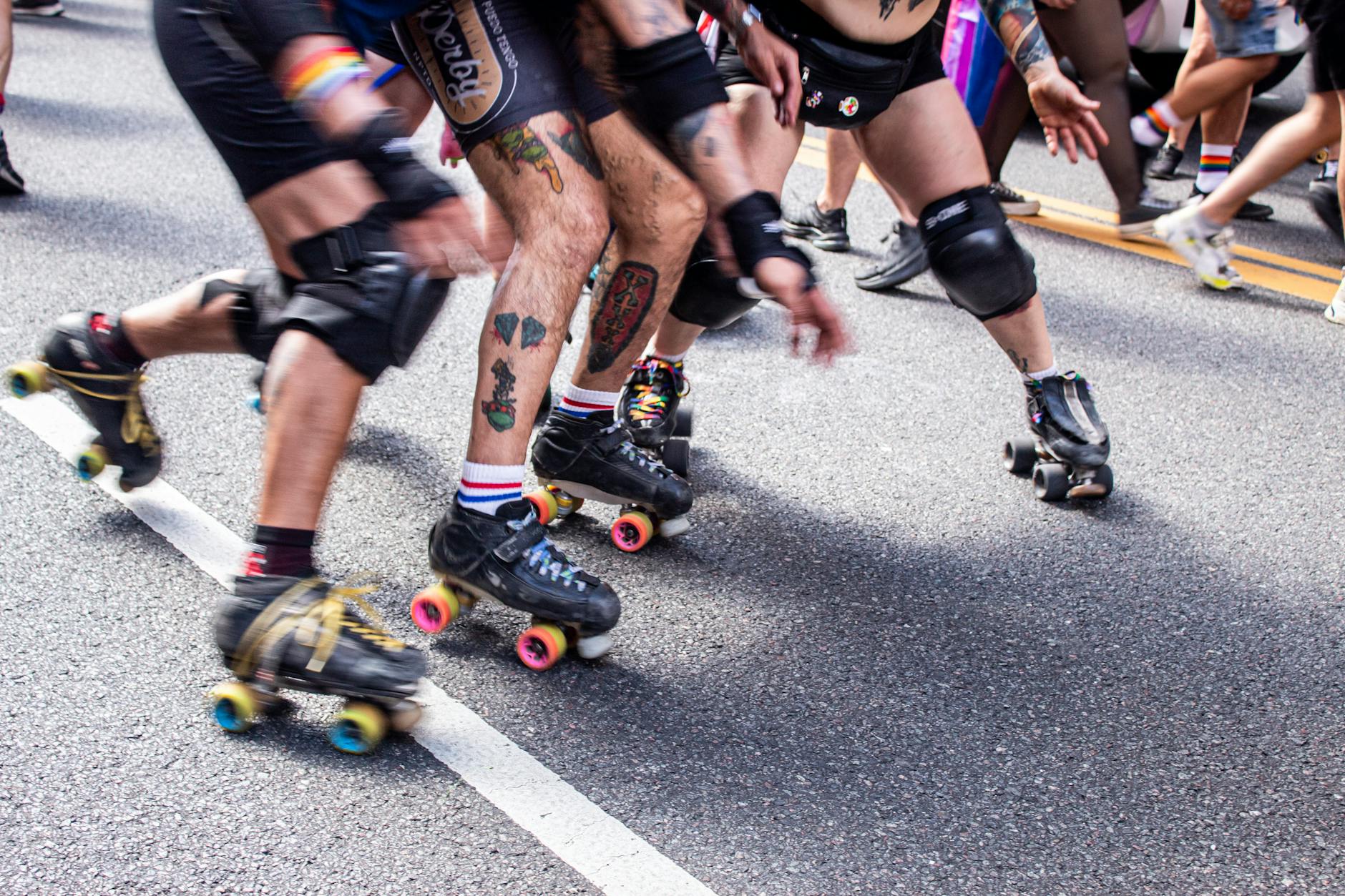 Dynamic roller derby competition showcasing colorful skates in Buenos Aires, Argentina streets.