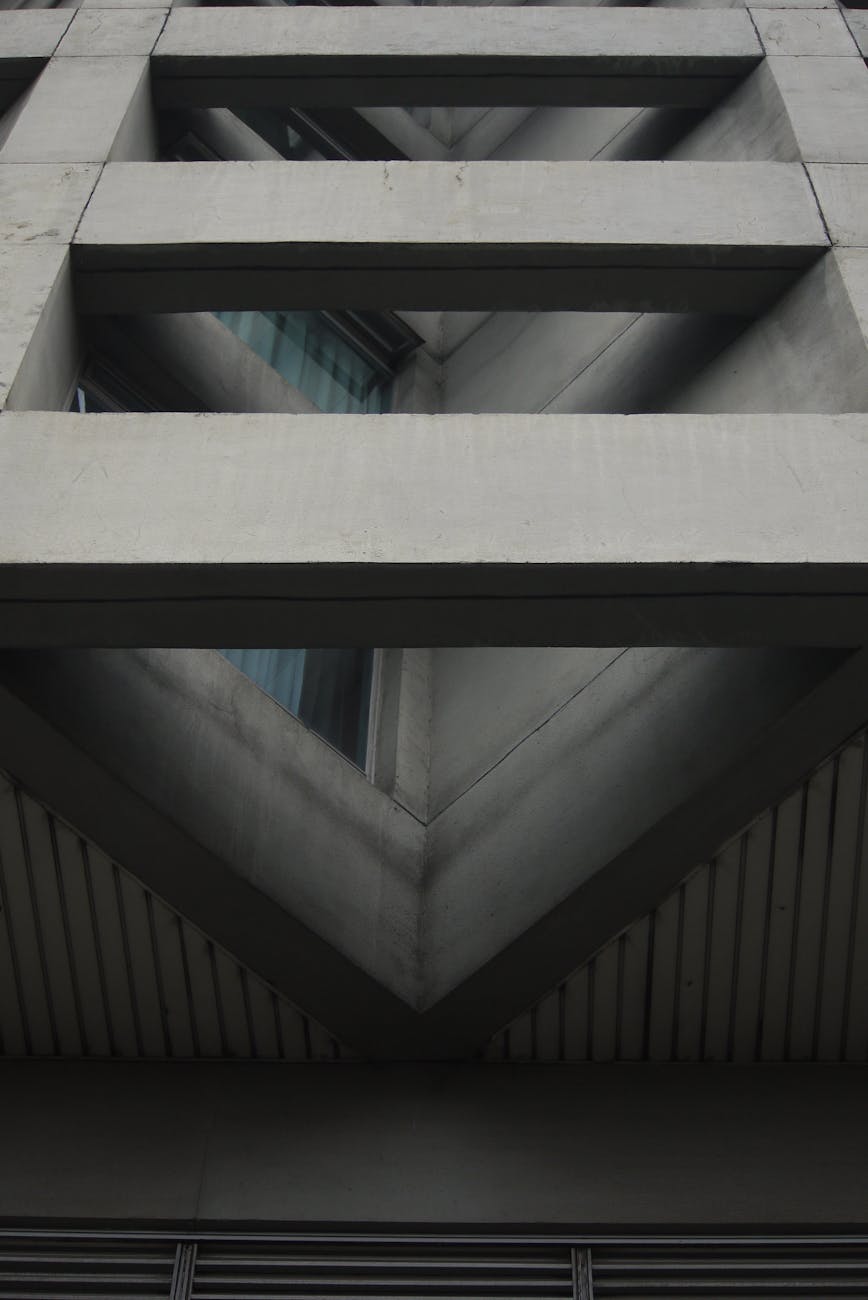 Close-up of a modern concrete facade showcasing architectural geometry in Jakarta, Indonesia.
