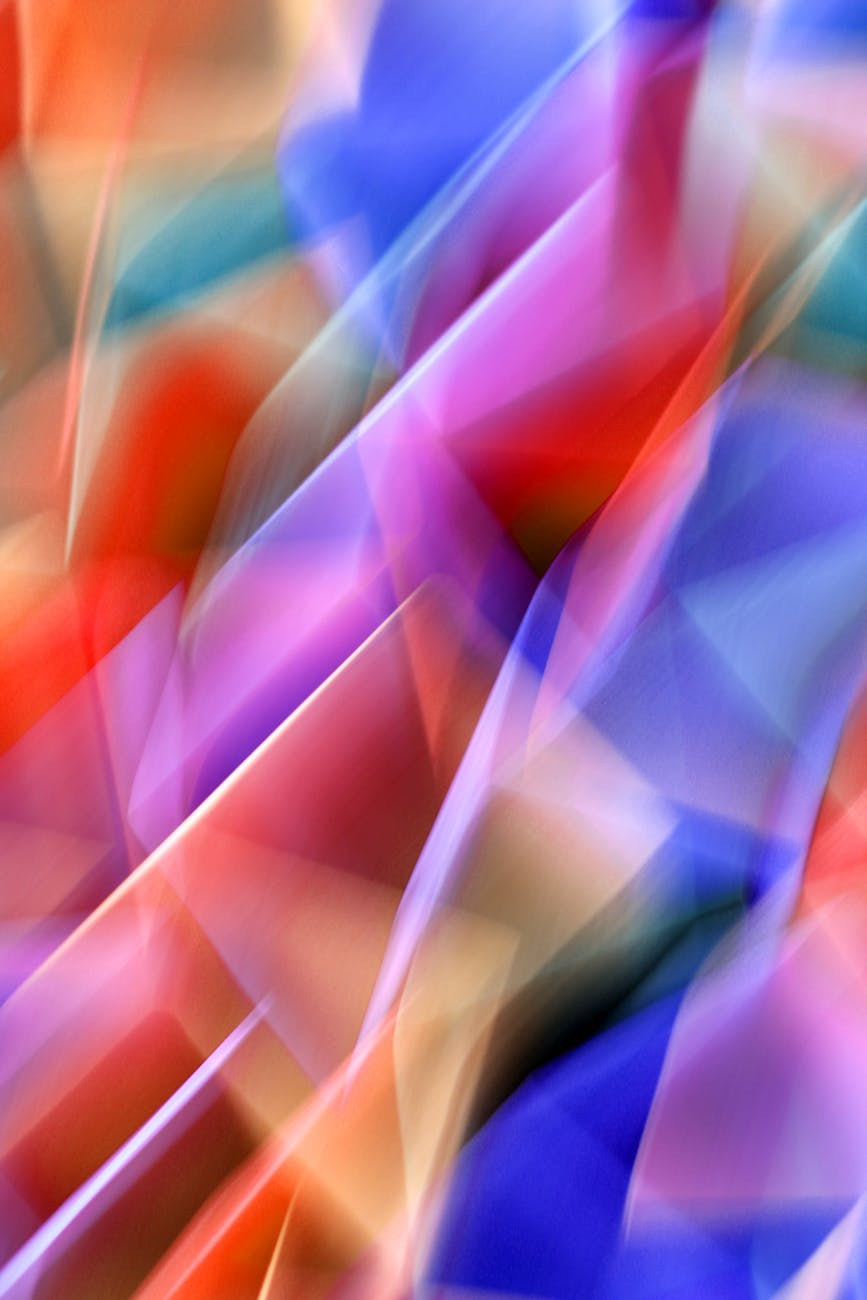 Colorful abstract design with geometric shapes and vibrant hues, creating a dynamic visual effect.