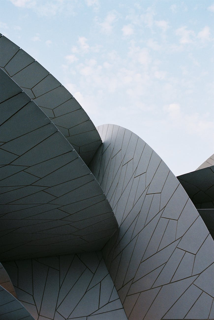 Close-up of the National Museum of Qatar's unique modern architecture in Doha.