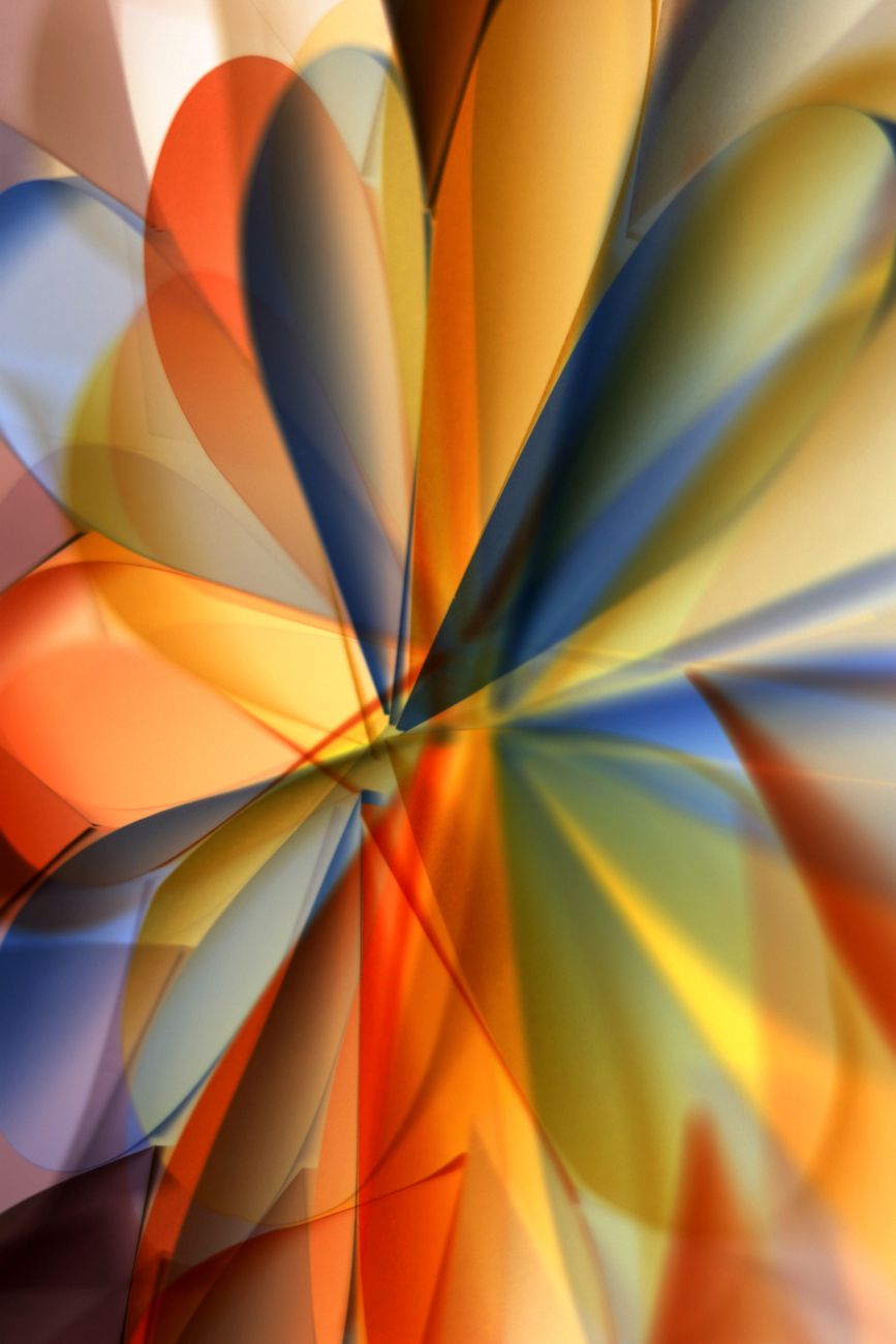 Vibrant abstract artwork featuring bold geometric shapes and vivid colors in an artistic design.