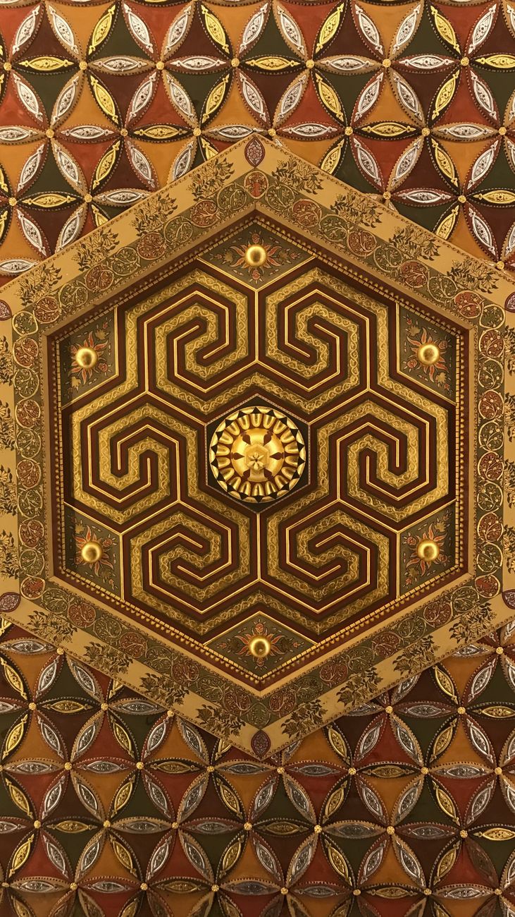 Detailed view of an ornate geometric ceiling pattern with hexagonal motifs in Türkiye.