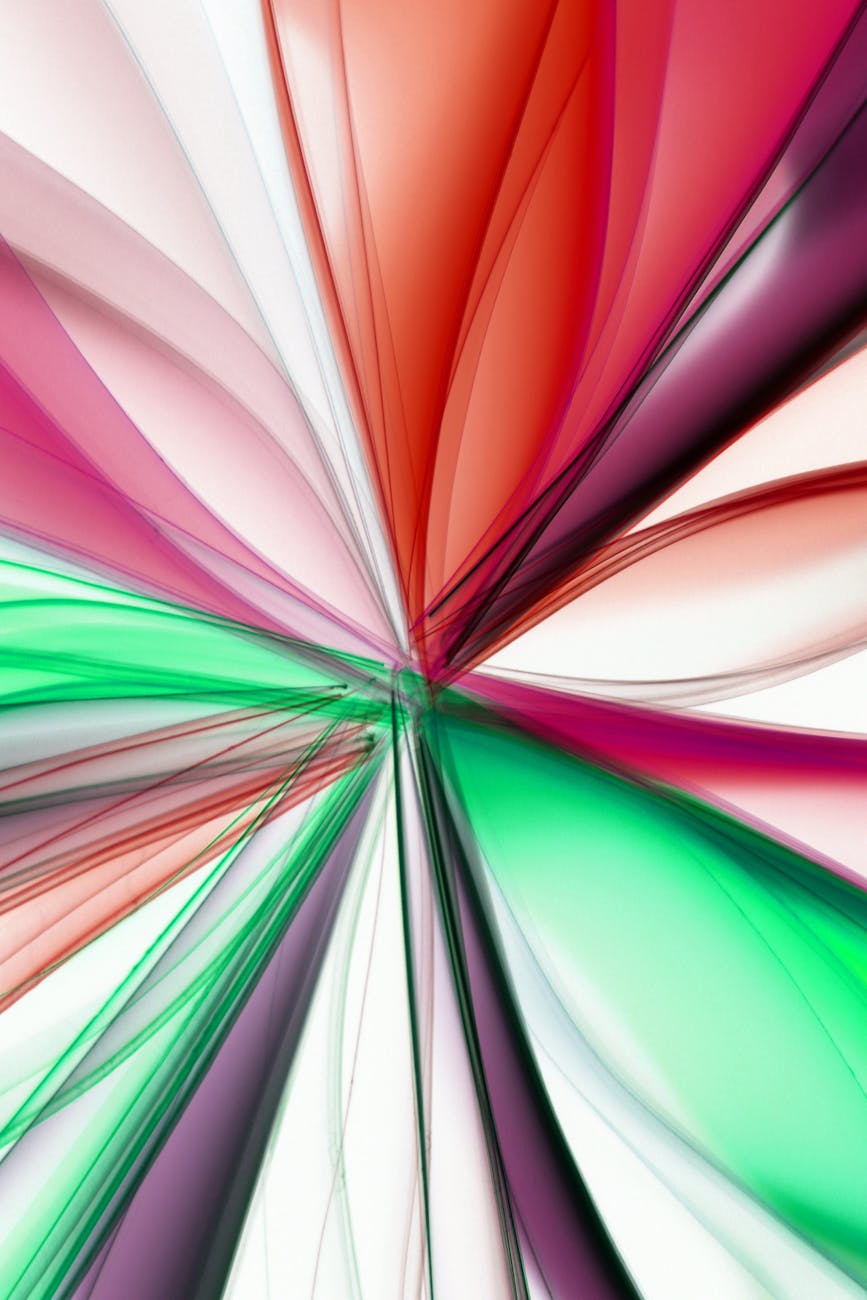 Dynamic abstract image featuring colorful red, green, and white flowing waves.