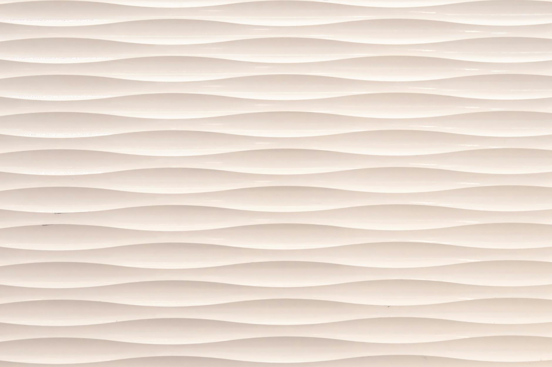 Seamless white wavy 3D texture, perfect for abstract and minimalist backgrounds.
