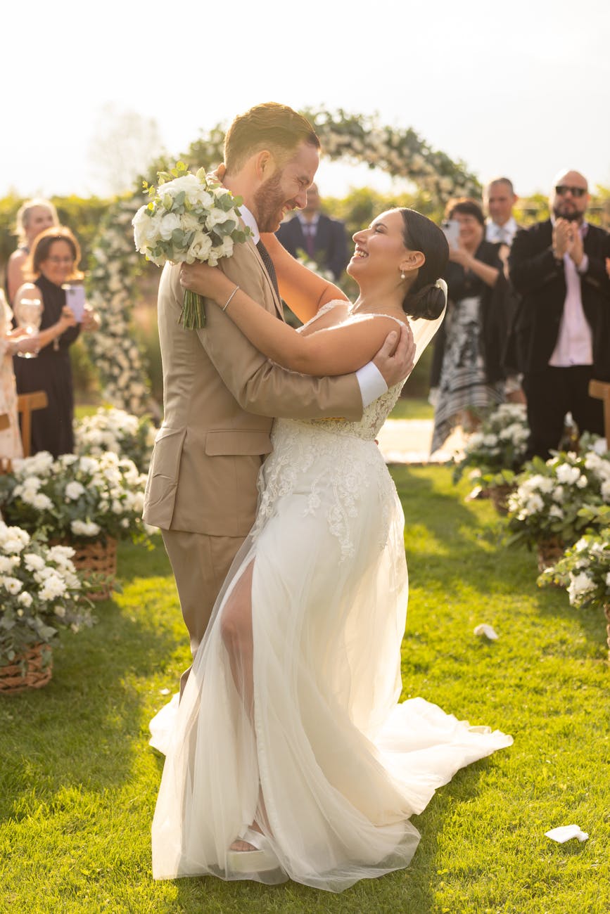 Happy couple celebrating their wedding ceremony outdoors in Mendoza, Argentina.