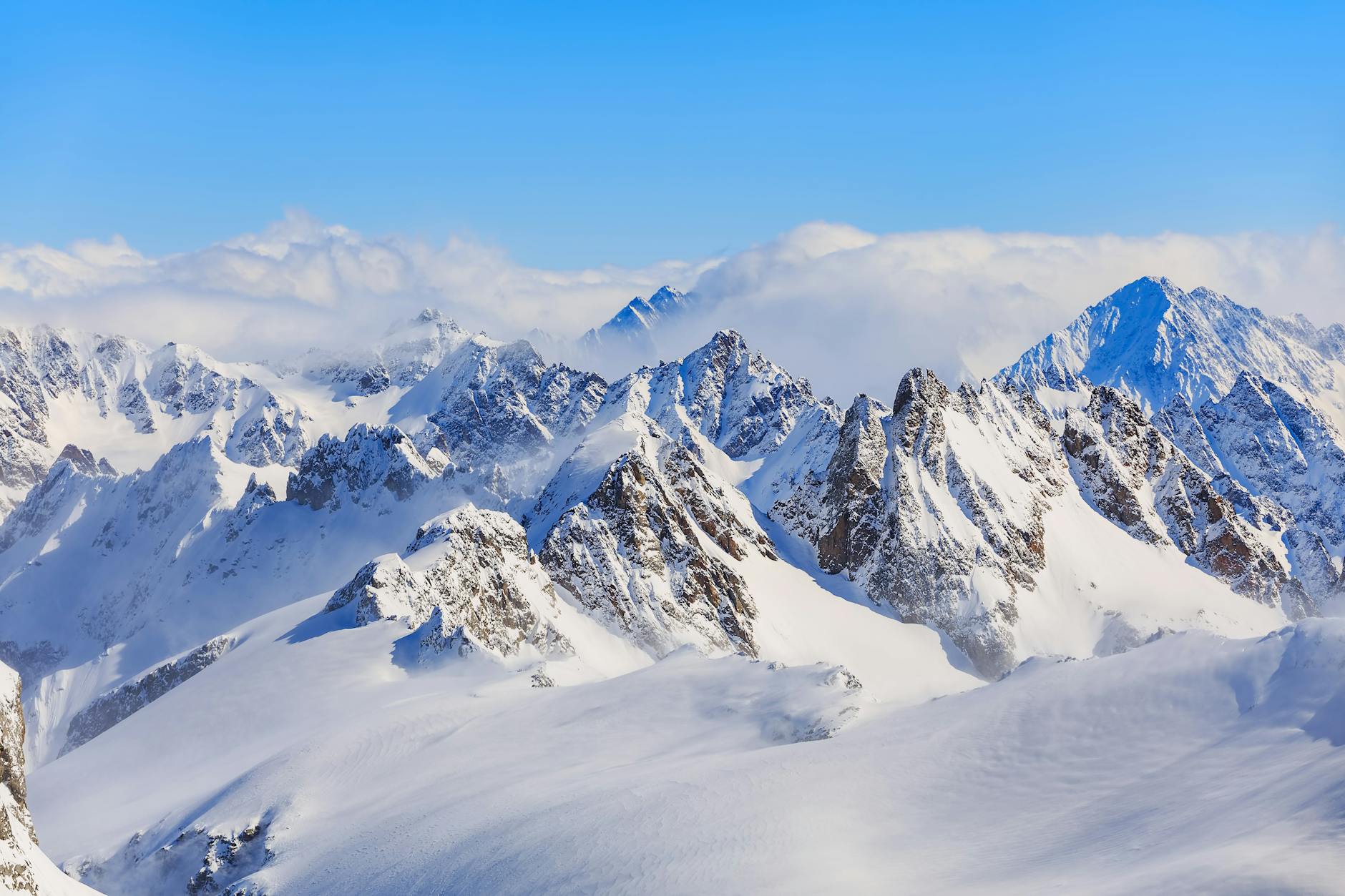 Breathtaking view of the snow-covered Alps from Engelberg, Switzerland.
